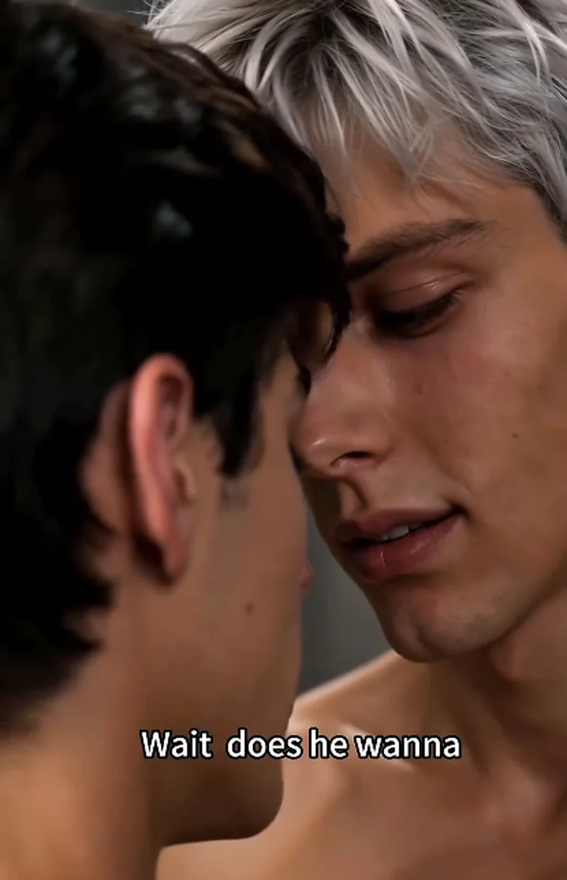 Extreme close-up of Dylan (silver hair, eyes closed) and Ethan (dark brown hair) with their foreheads pressed together, bare shoulders visible, soft lighting highlighting facial tension.